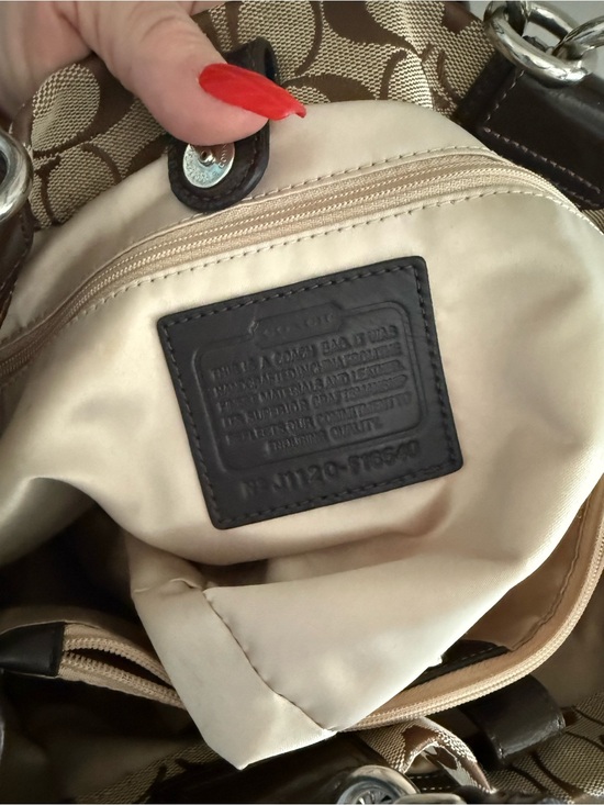 Coach Signature Canvas Shoulder Bag in Brown. Matching Coach wallet main image 5